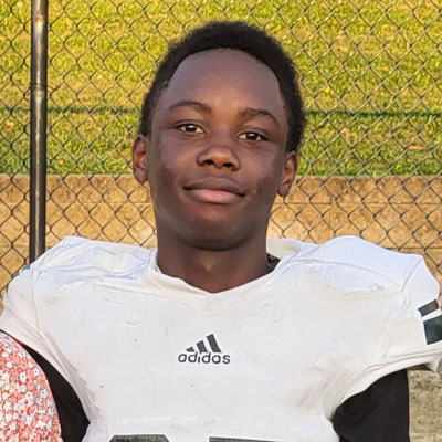 Young man in football uniform.