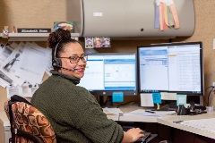 Employee Elizabeth Rosa in her office 