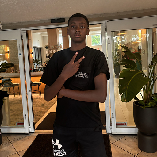 young man standing and smiling