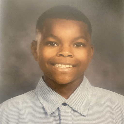 school photo of a young man smiling